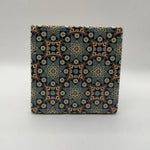 Ethnics pattern number 04 printed on a natural travertine stone coaster