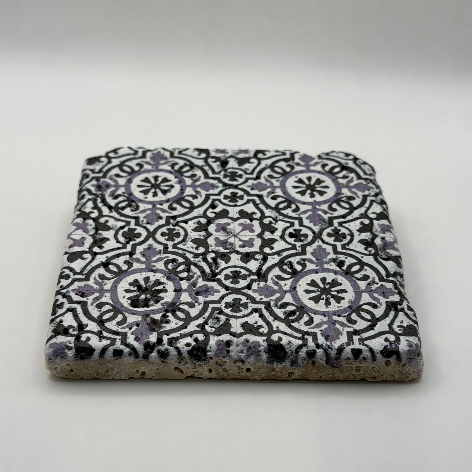 Ethnics pattern number 05 printed on a natural travertine stone coaster