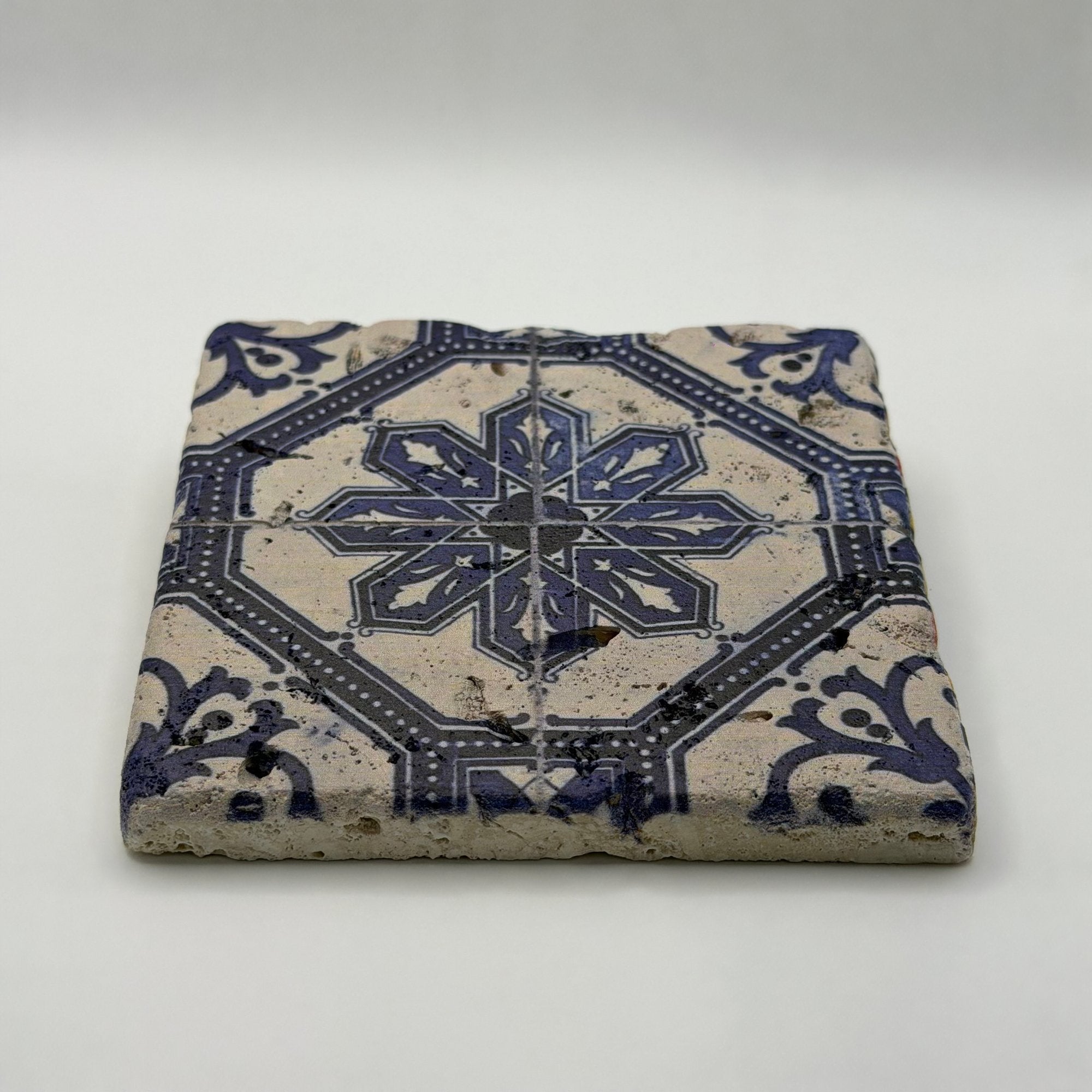 Ethnics pattern number 06 printed on a natural travertine stone coaster