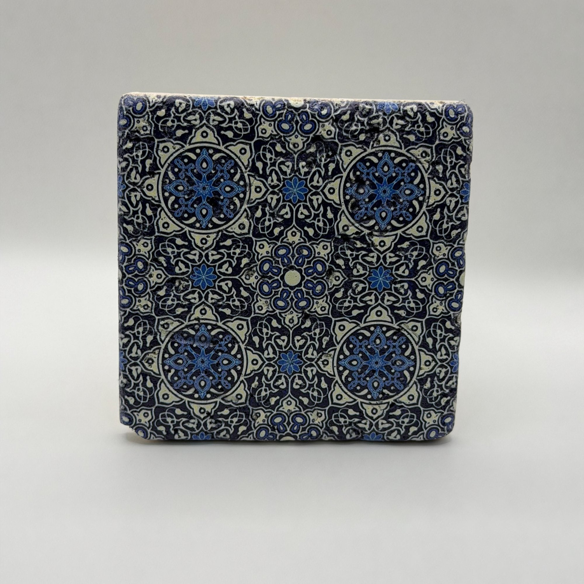 Ethnics pattern number 07 printed on a natural travertine stone coaster