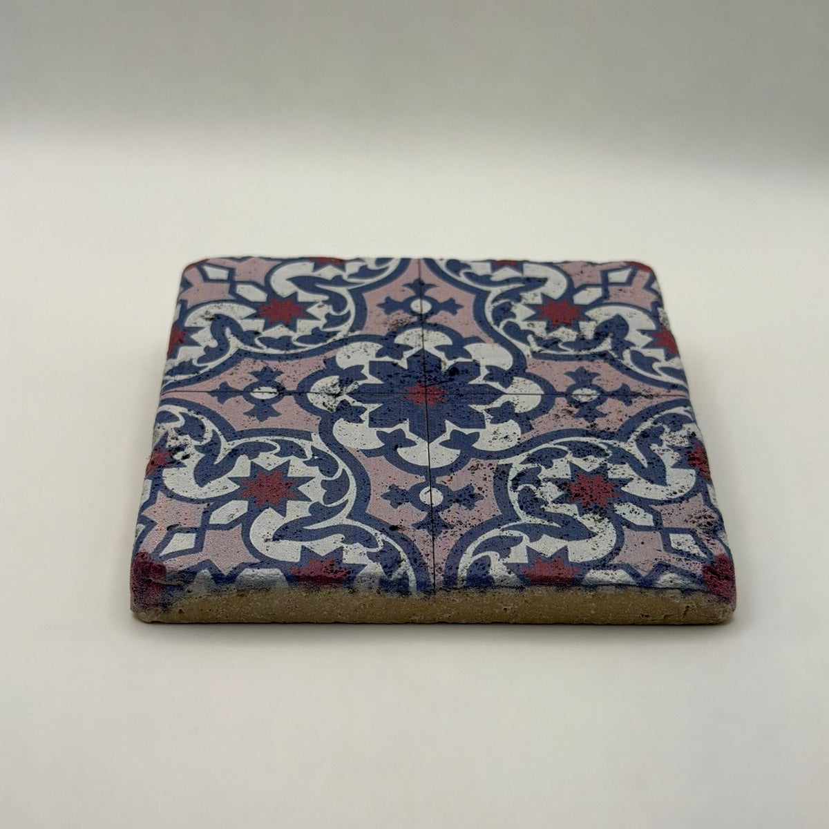 Ethnics pattern number 08 printed on a natural travertine stone coaster