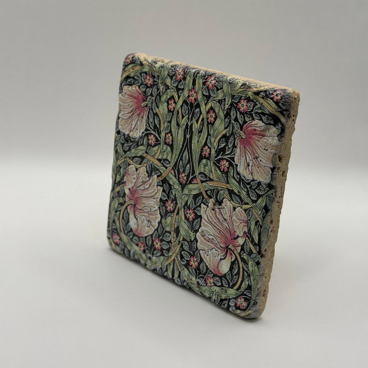Ethnics pattern number 09 printed on a natural travertine stone coaster