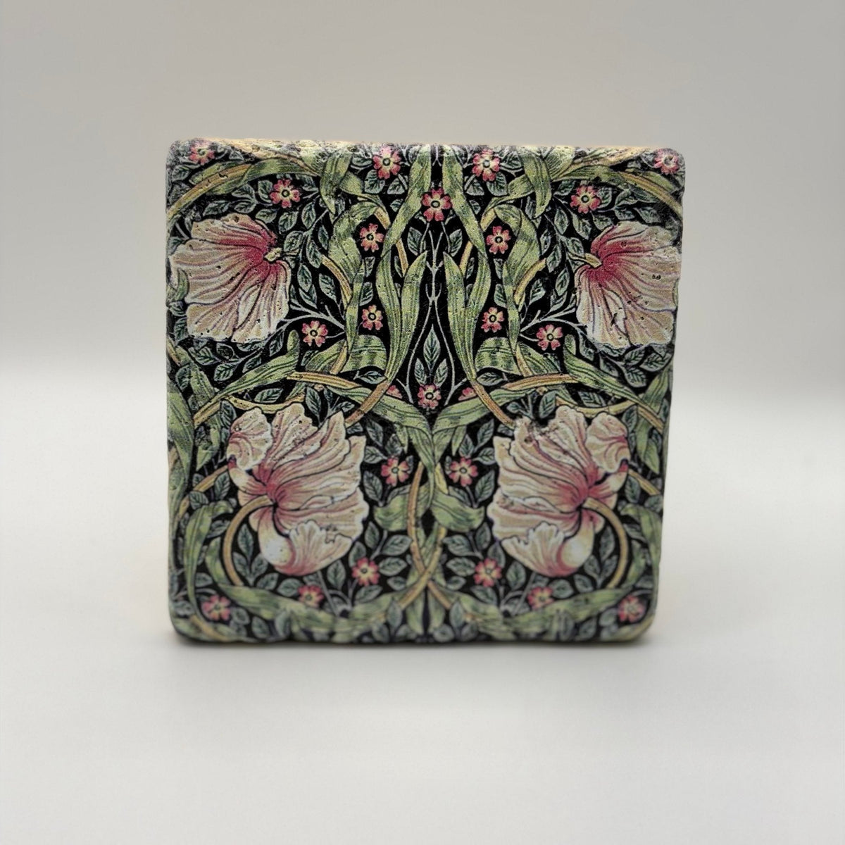 Ethnics pattern number 09 printed on a natural travertine stone coaster