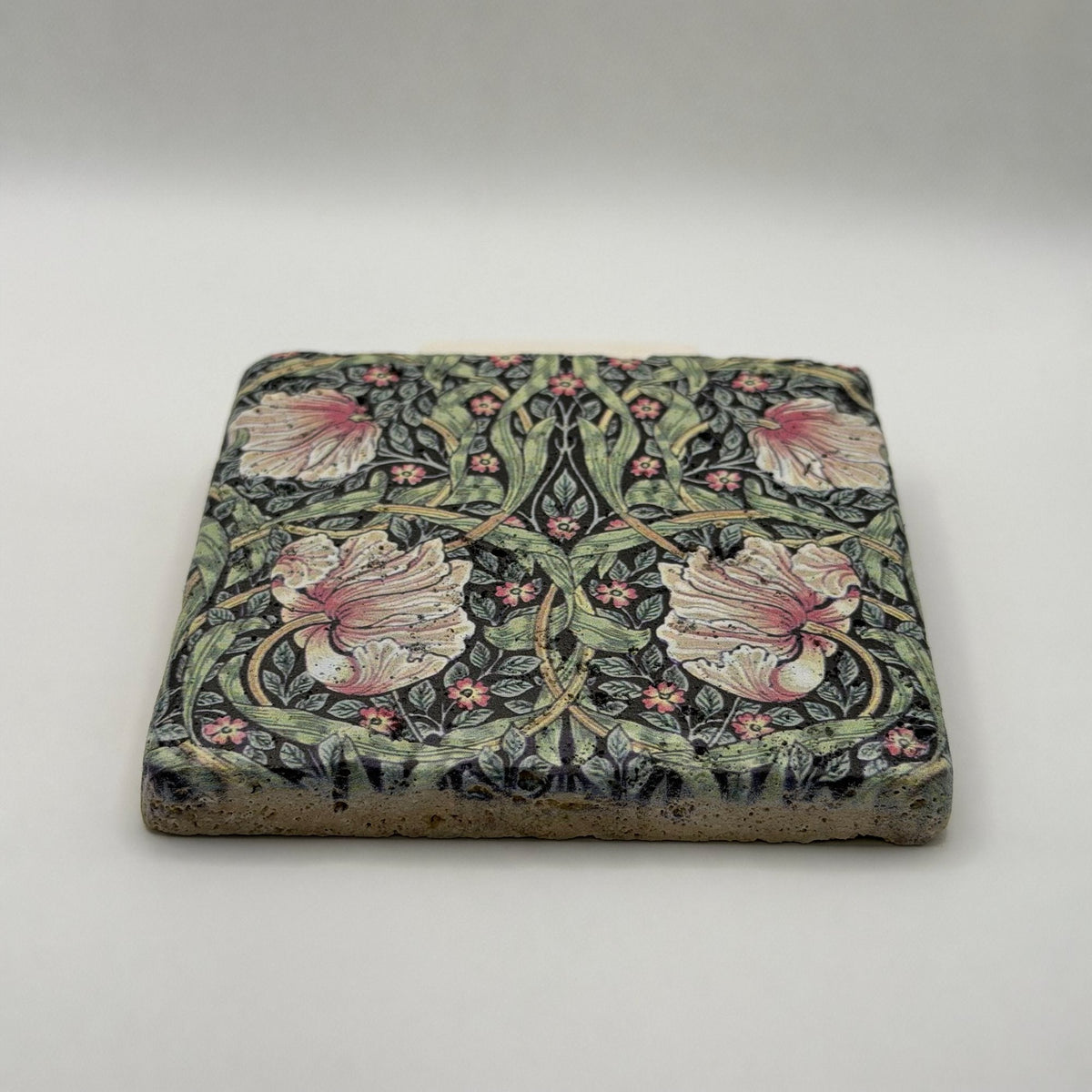 Ethnics pattern number 09 printed on a natural travertine stone coaster