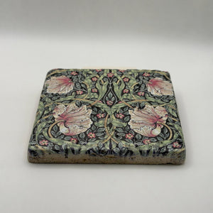 Ethnics pattern number 09 printed on a natural travertine stone coaster