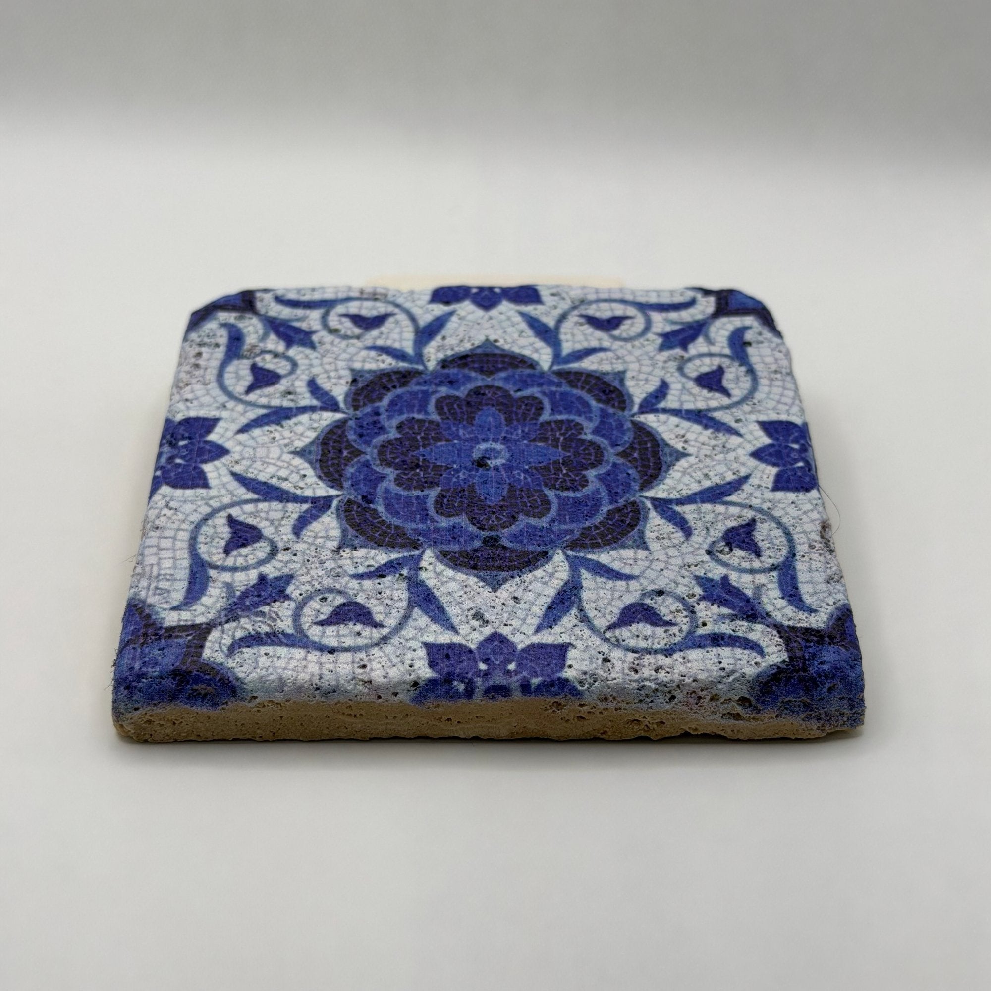 Ethnics pattern number 10 printed on a natural travertine stone coaster