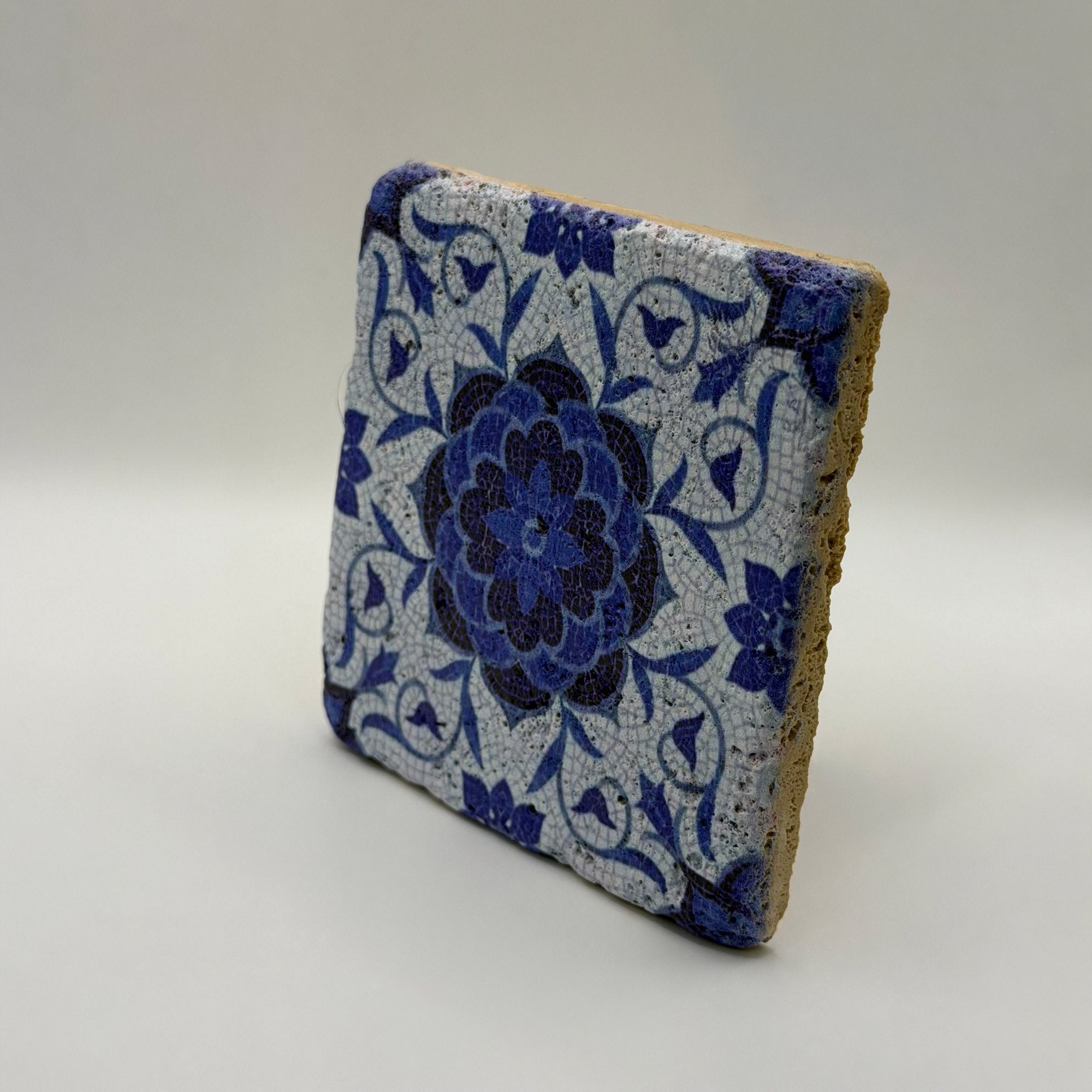 Ethnics pattern number 10 printed on a natural travertine stone coaster