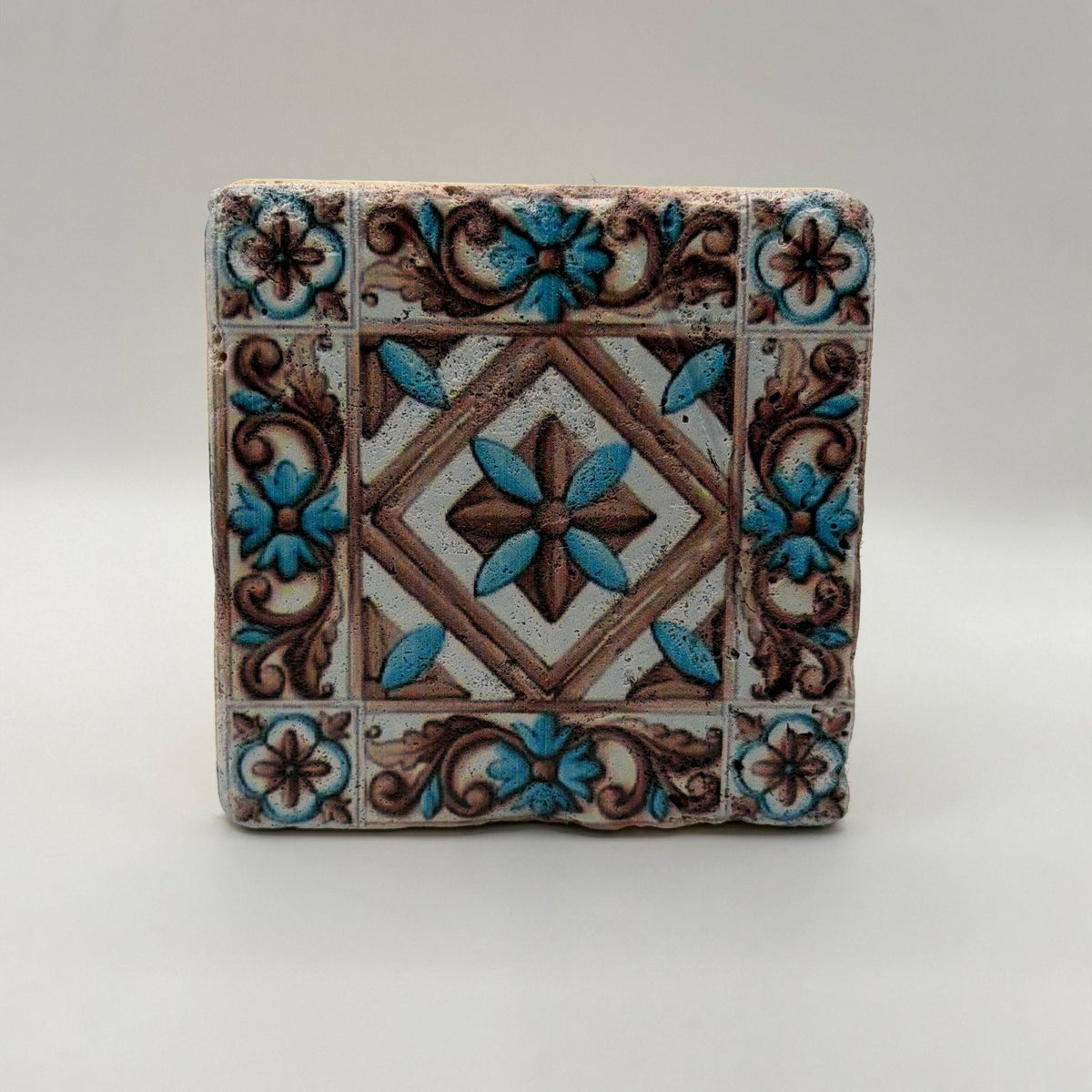 Ethnics pattern number 11 printed on a natural travertine stone coaster