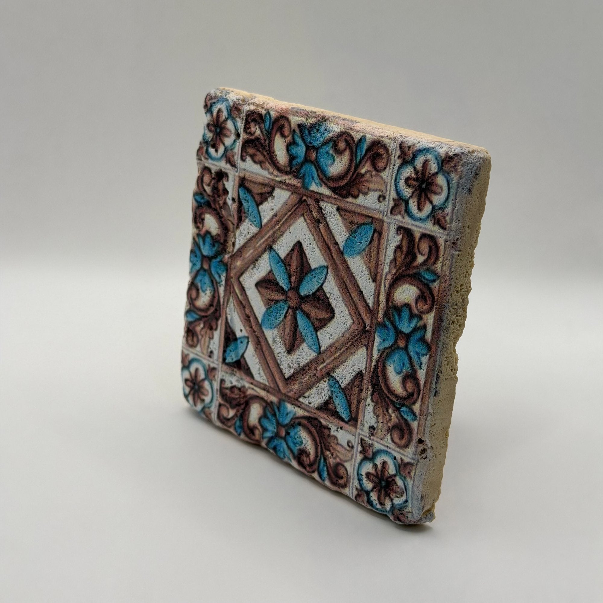 Ethnics pattern number 11 printed on a natural travertine stone coaster