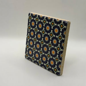 Ethnics pattern number 12 printed on a natural travertine stone coaster