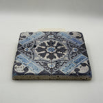 Ethnics pattern number 13 printed on a natural travertine stone coaster