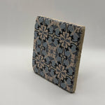 Ethnics pattern number 14 printed on a natural travertine stone coaster