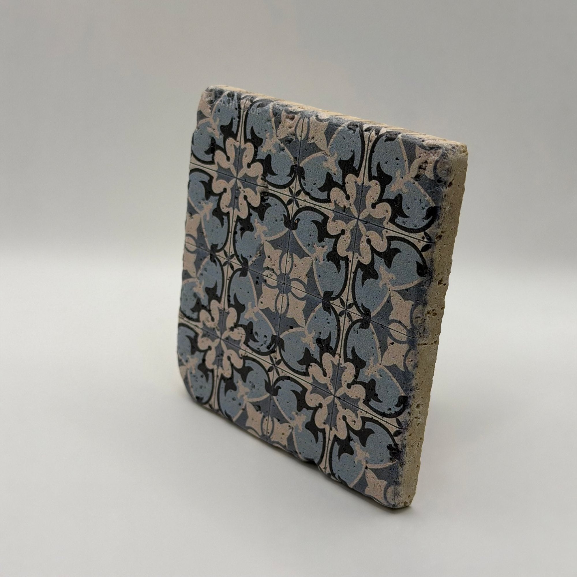 Ethnics pattern number 14 printed on a natural travertine stone coaster
