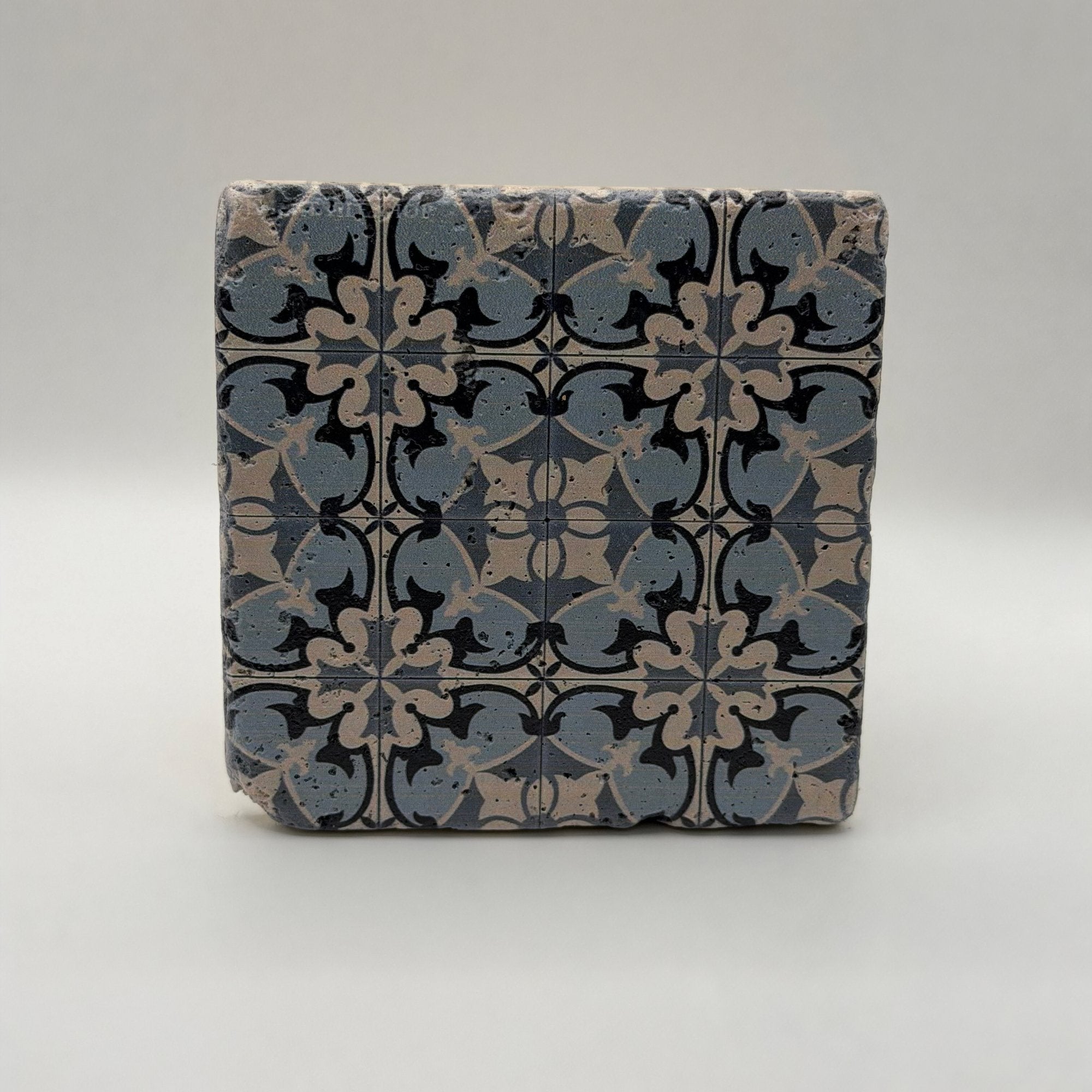Ethnics pattern number 14 printed on a natural travertine stone coaster