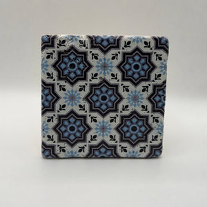 Ethnics pattern number 15 printed on a natural travertine stone coaster