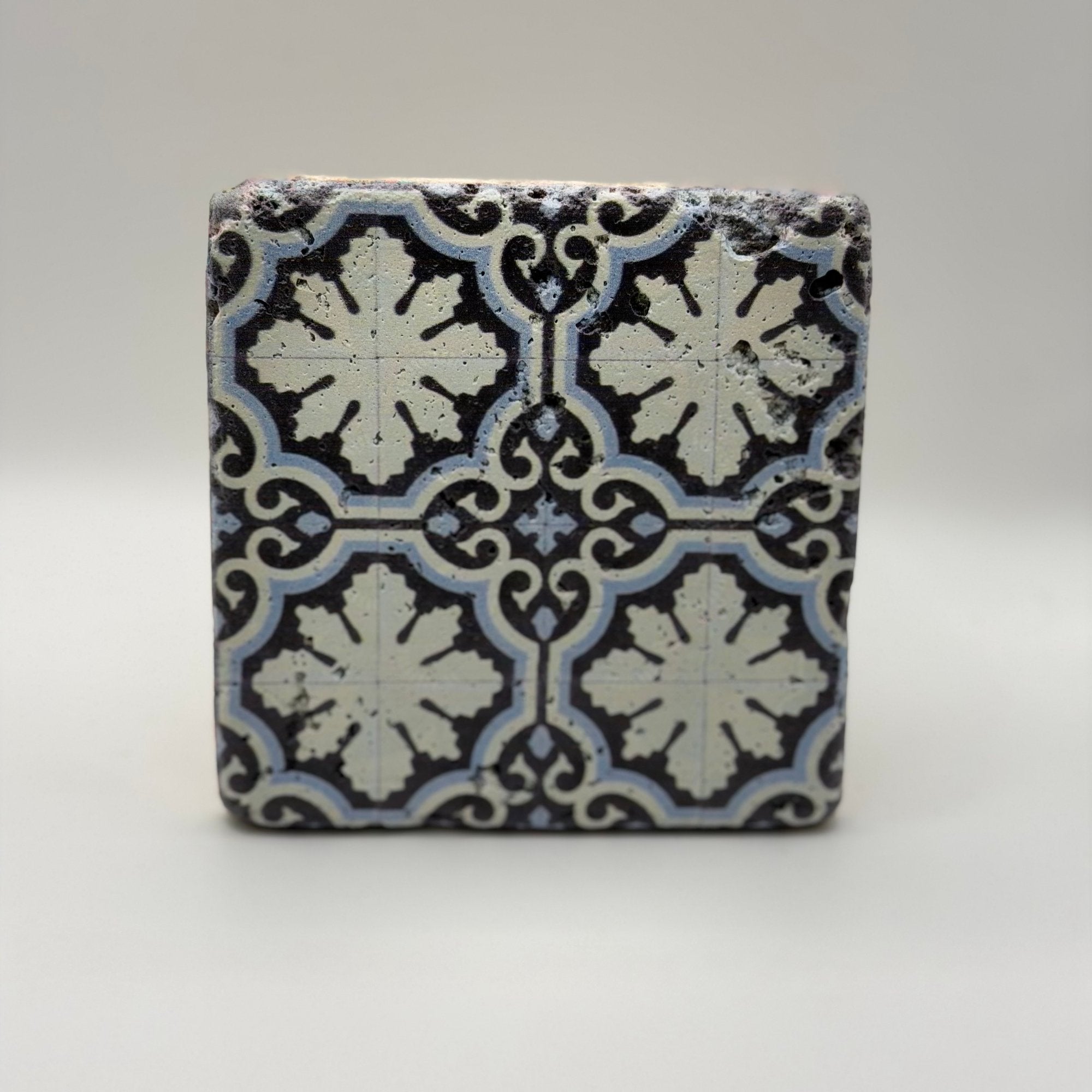 Ethnics pattern number 16 printed on a natural travertine stone coaster