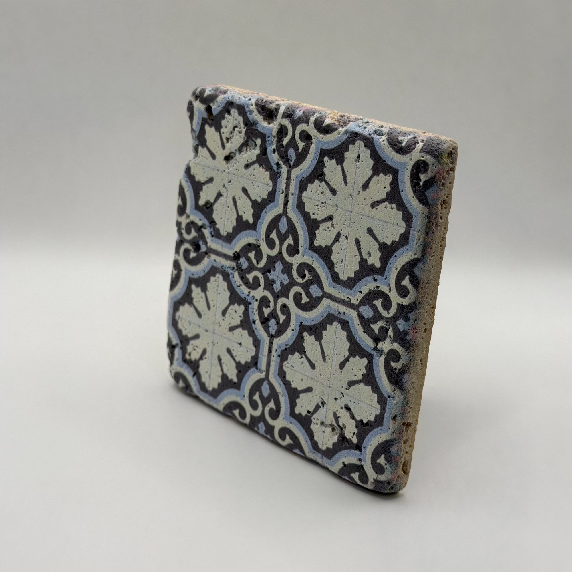 Ethnics pattern number 16 printed on a natural travertine stone coaster
