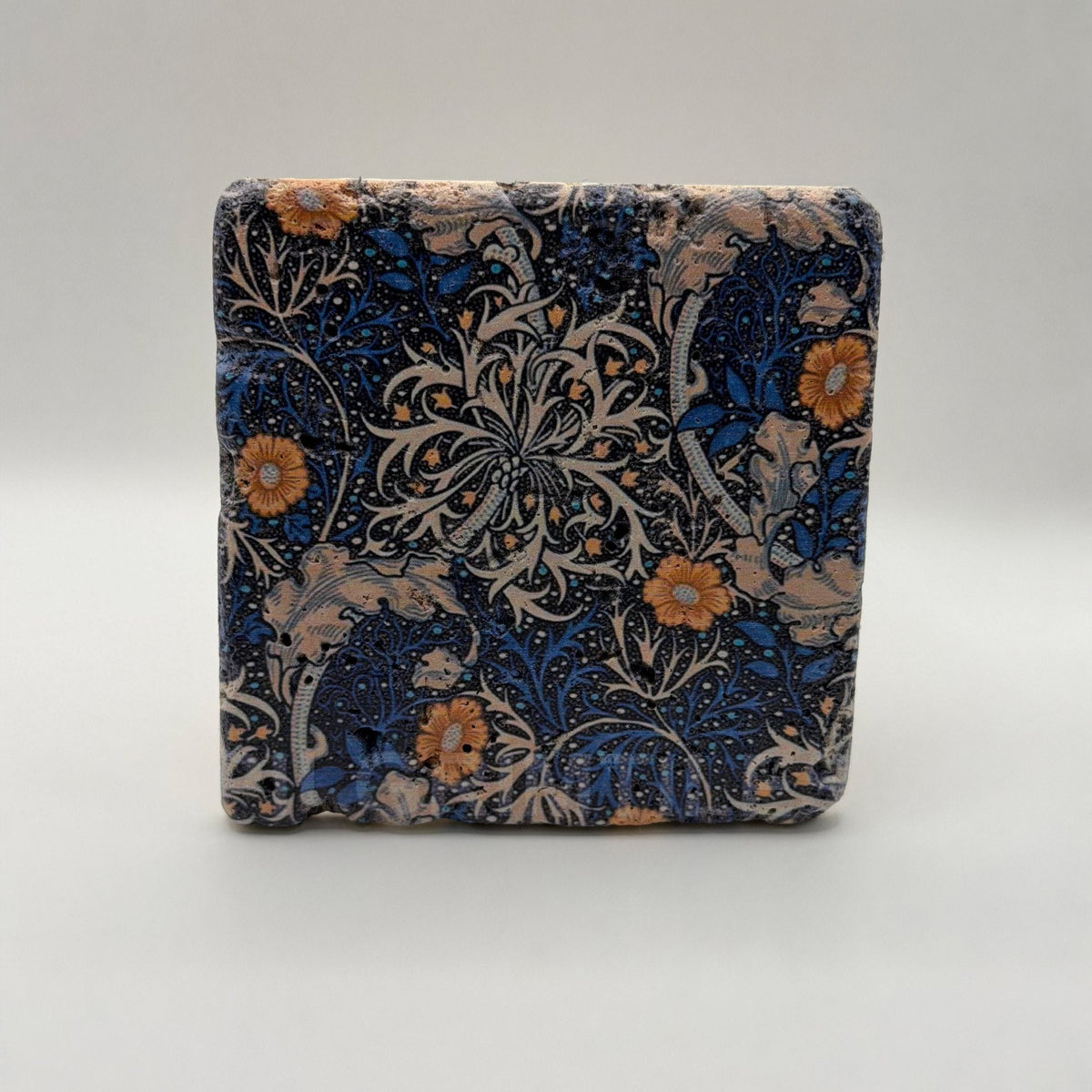 Ethnics pattern number 17 printed on a natural travertine stone coaster