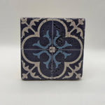 Ethnics pattern number 19 printed on a natural travertine stone coaster