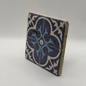 Ethnics pattern number 19 printed on a natural travertine stone coaster