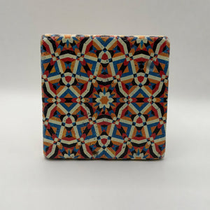 Ethnics pattern number 20 printed on a natural travertine stone coaster