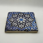 Ethnics pattern number 21 printed on a natural travertine stone coaster