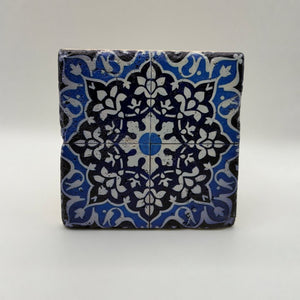 Ethnics pattern number 21 printed on a natural travertine stone coaster