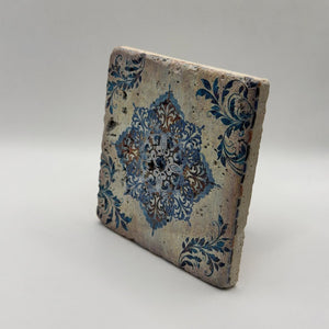Ethnics pattern number 22 printed on a natural travertine stone coaster
