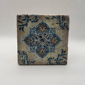 Ethnics pattern number 22 printed on a natural travertine stone coaster