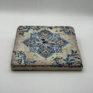 Ethnics pattern number 22 printed on a natural travertine stone coaster