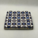 Ethnics pattern number 23 printed on a natural travertine stone coaster
