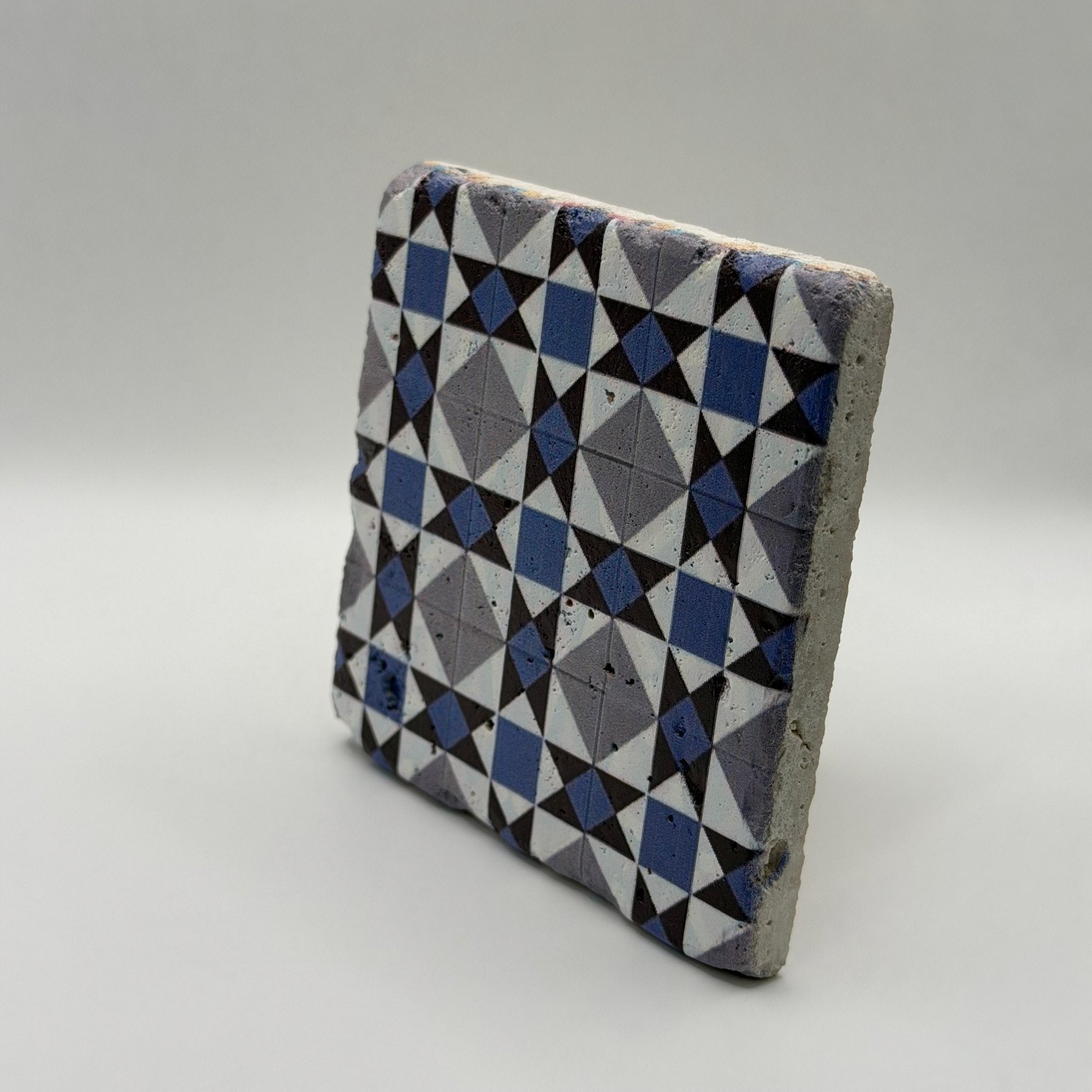 Ethnics pattern number 23 printed on a natural travertine stone coaster