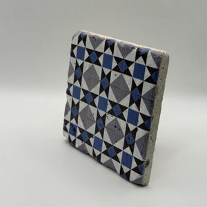 Ethnics pattern number 23 printed on a natural travertine stone coaster