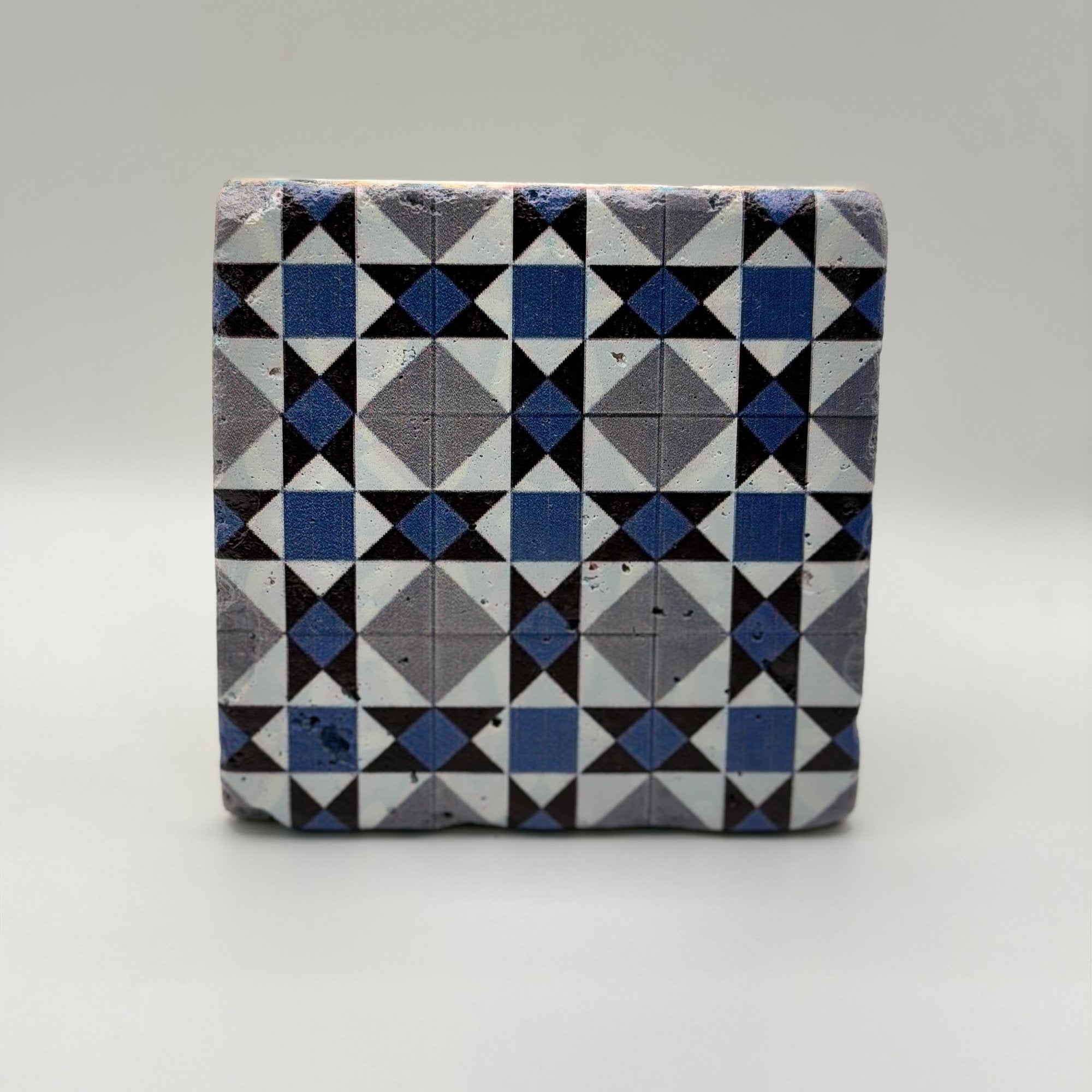 Ethnics pattern number 23 printed on a natural travertine stone coaster