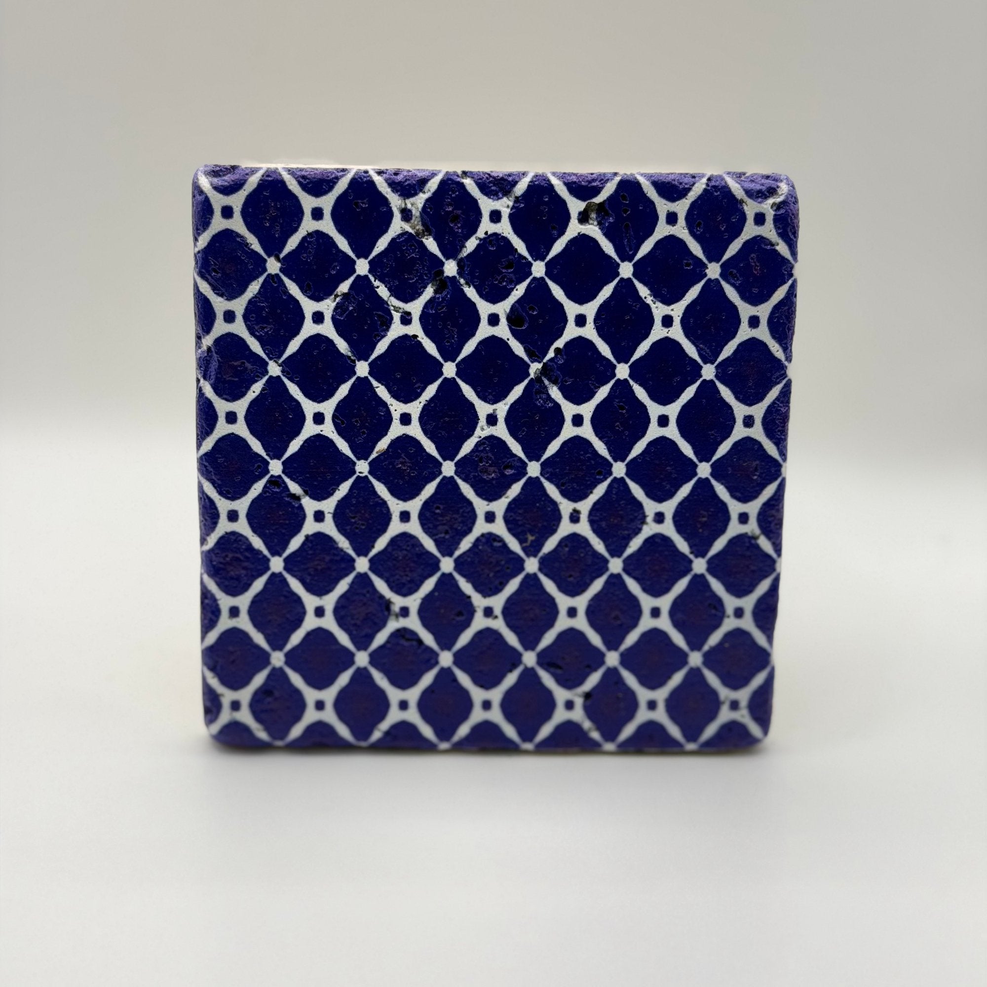 Ethnics pattern number 26 printed on a natural travertine stone coaster
