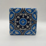 Ethnics pattern number 27 printed on a natural travertine stone coaster