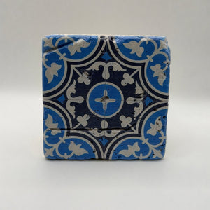 Ethnics pattern number 27 printed on a natural travertine stone coaster
