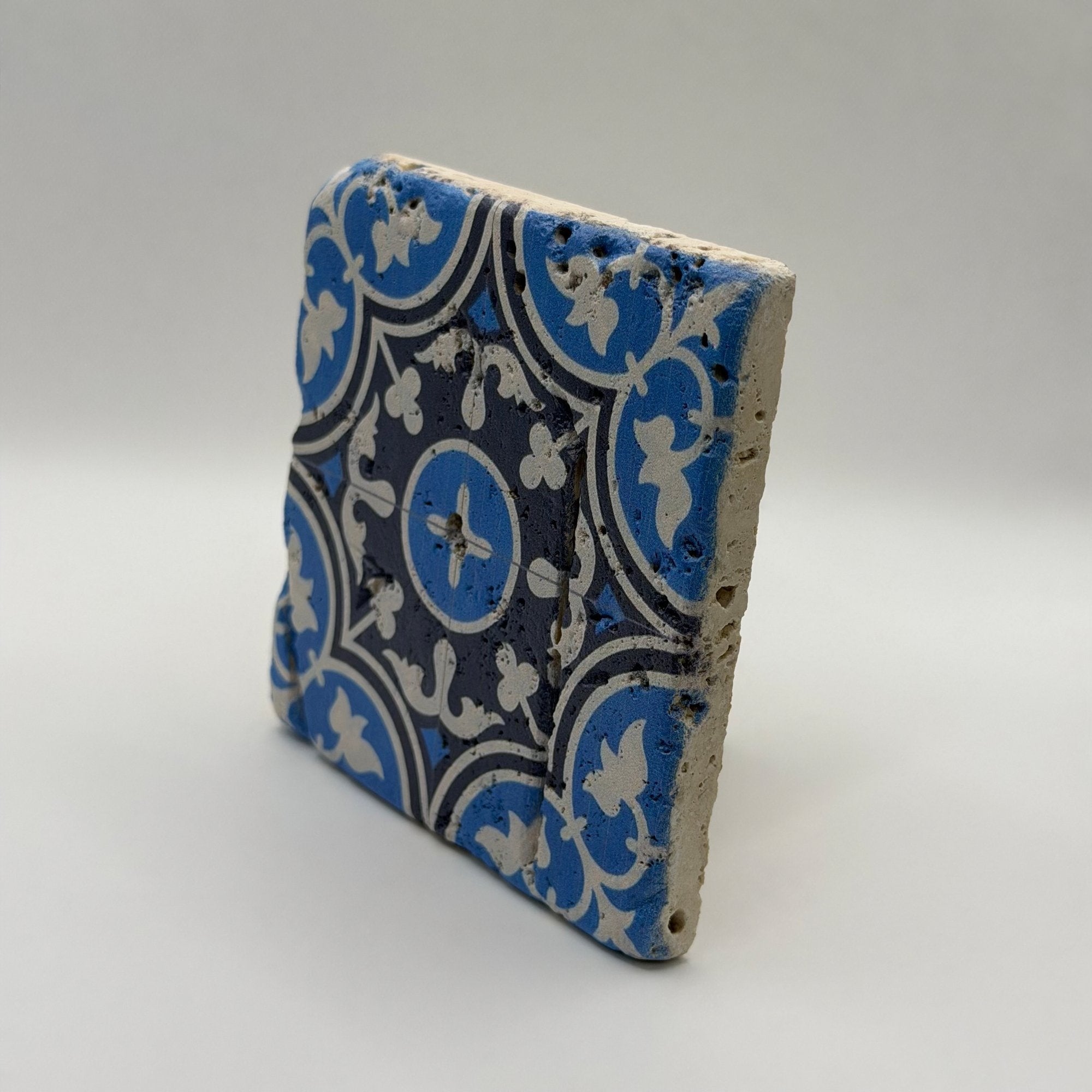 Ethnics pattern number 27 printed on a natural travertine stone coaster