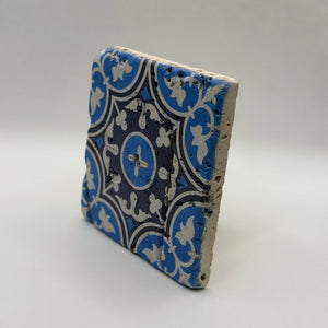 Ethnics pattern number 27 printed on a natural travertine stone coaster