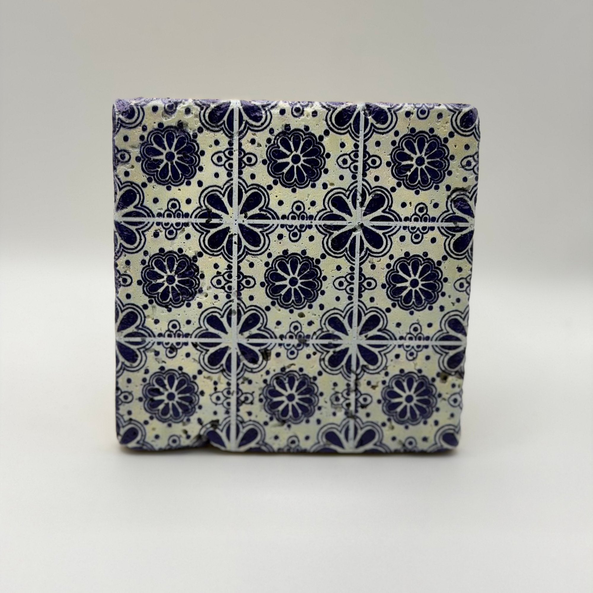 Ethnics pattern number 28 printed on a natural travertine stone coaster