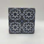 Ethnics pattern number 29 printed on a natural travertine stone coaster