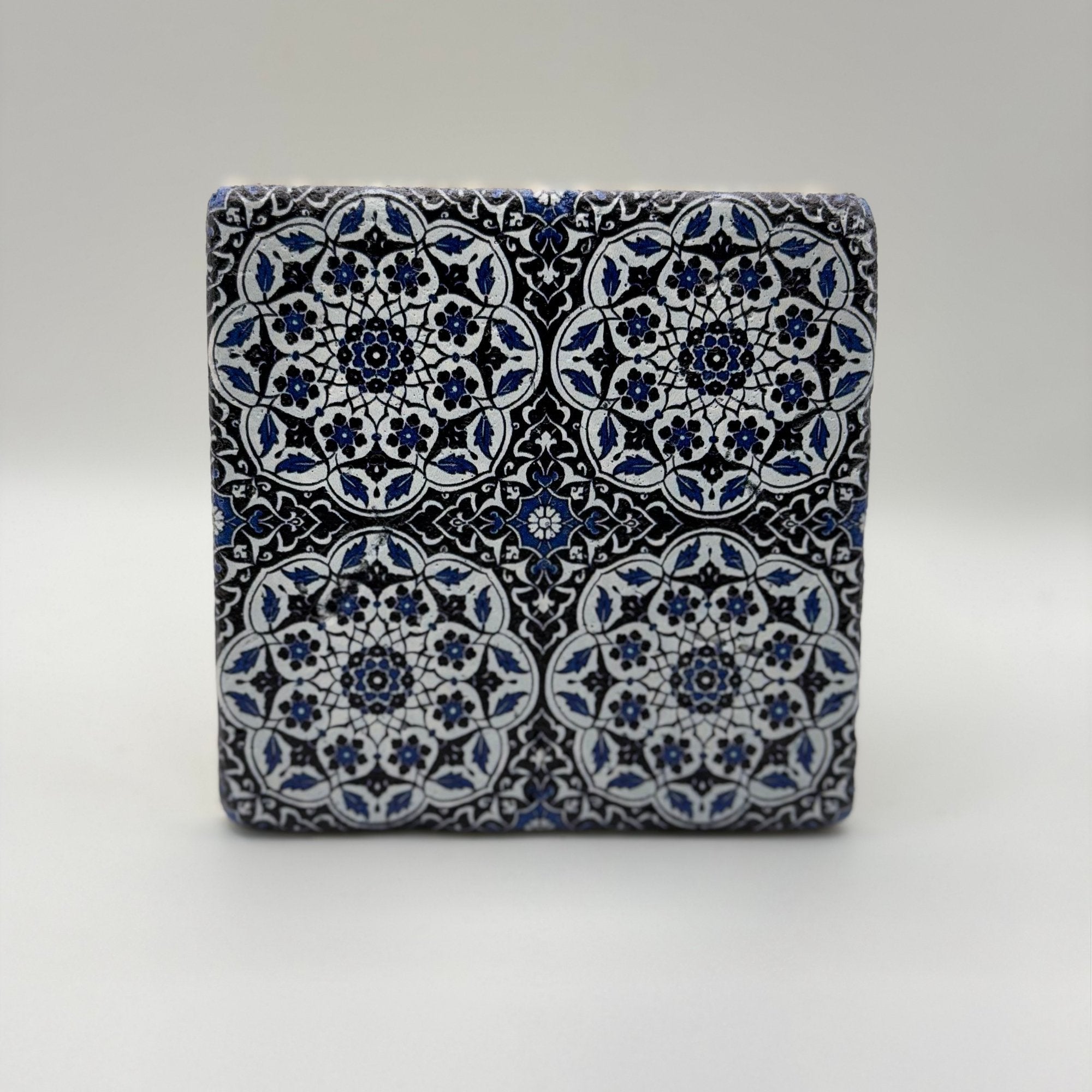 Ethnics pattern number 29 printed on a natural travertine stone coaster