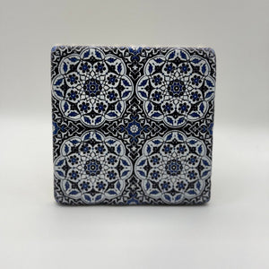 Ethnics pattern number 29 printed on a natural travertine stone coaster