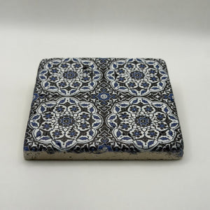 Ethnics pattern number 29 printed on a natural travertine stone coaster