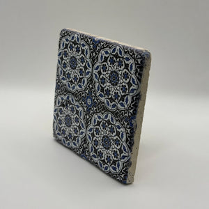 Ethnics pattern number 29 printed on a natural travertine stone coaster