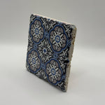 Ethnics pattern number 30 printed on a natural travertine stone coaster