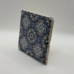 Ethnics pattern number 30 printed on a natural travertine stone coaster