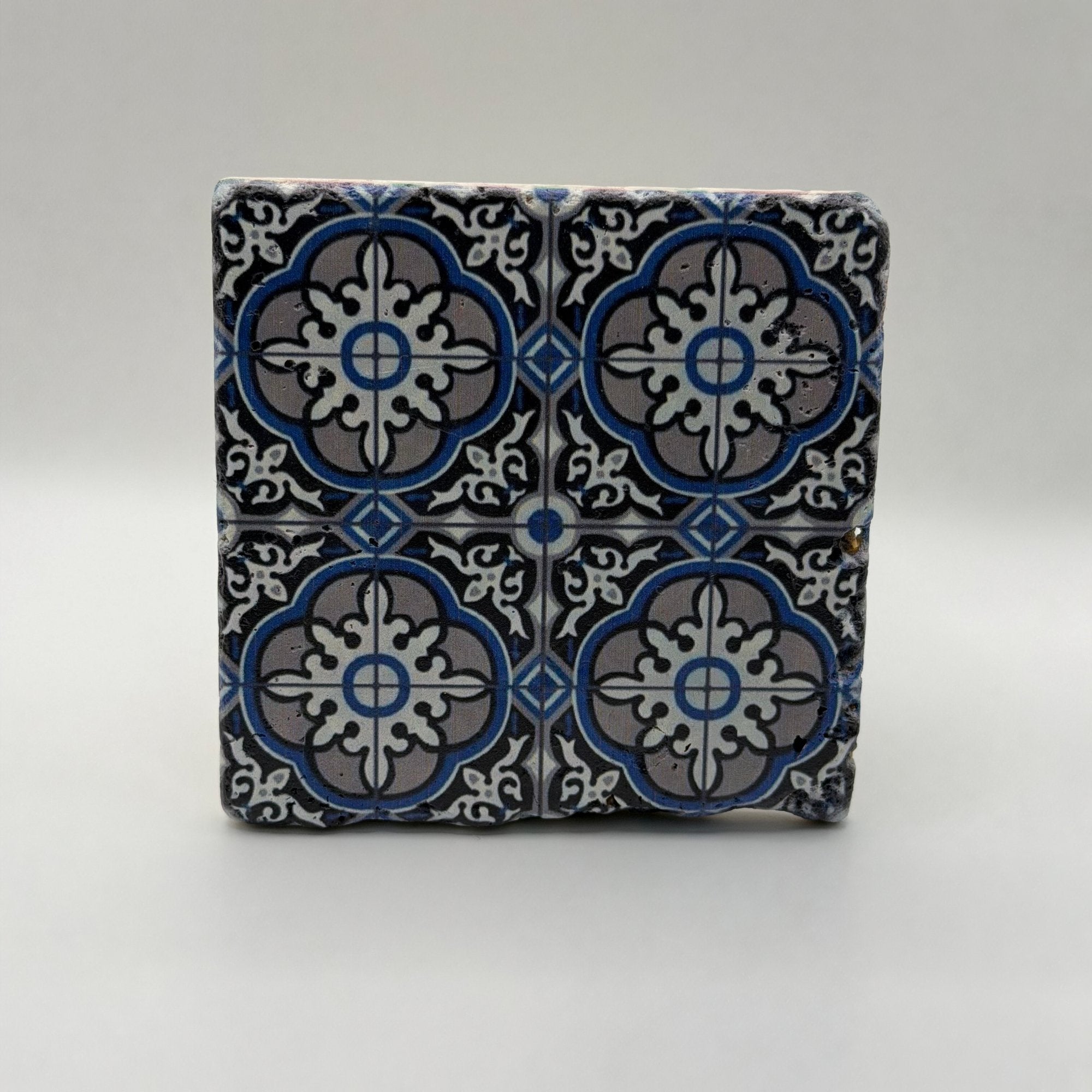 Ethnics pattern number 30 printed on a natural travertine stone coaster