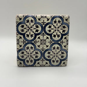 Ethnics pattern number 31 printed on a natural travertine stone coaster