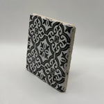 Ethnics pattern number 32 printed on a natural travertine stone coaster